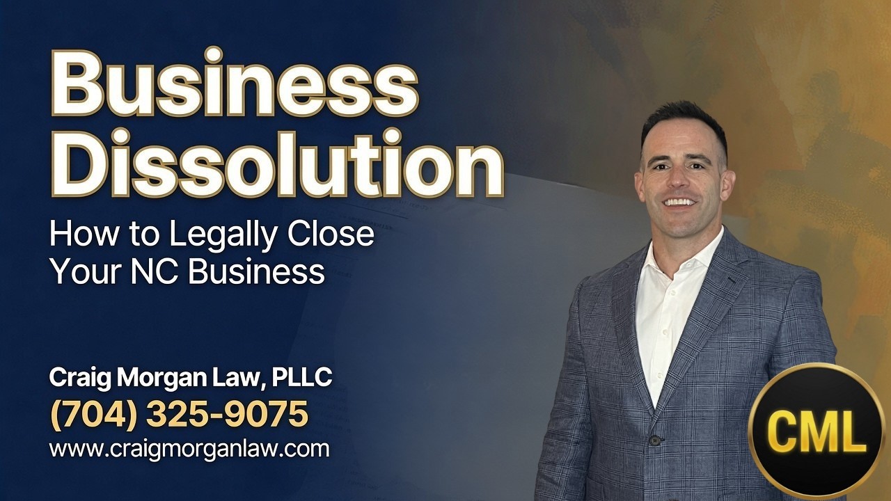 Craig Morgan, Esq. explaining how to legally dissolve a business in North Carolina with legal documents and a red Dissolution title