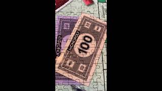 Monopoly Jigsaw board. Explore the board, see all the properties. Money to spend.