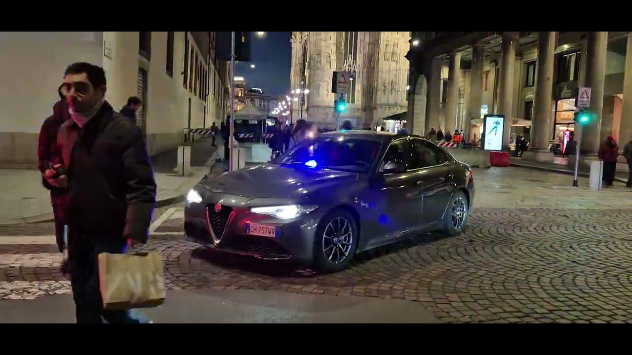 CARABINIERI SCORTANO AUTORITÀ A MILANO CENTRO IN SIRENA PER LE OLIMPIADI INVERNALI 2026