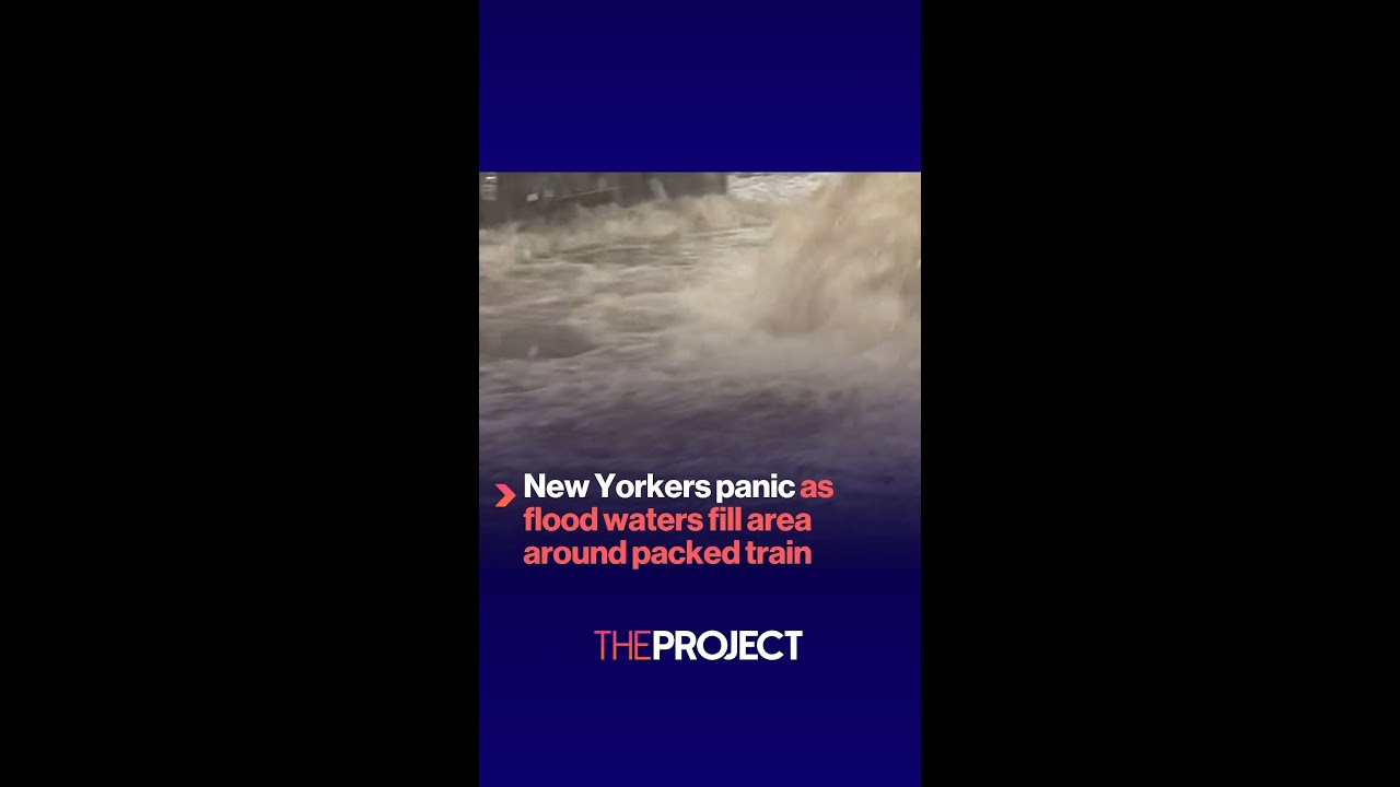 New Yorkers panic as flood waters fill area around packed train