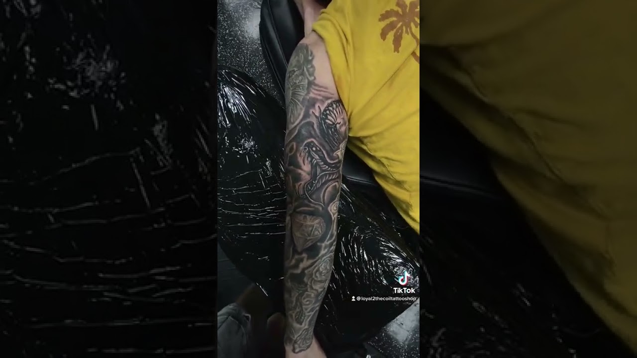 Black and grey snake 🐍 tattoo sleeve filler done by DJ Guinan 🤘🏼at Loyal 2 The Coil Tattoos!