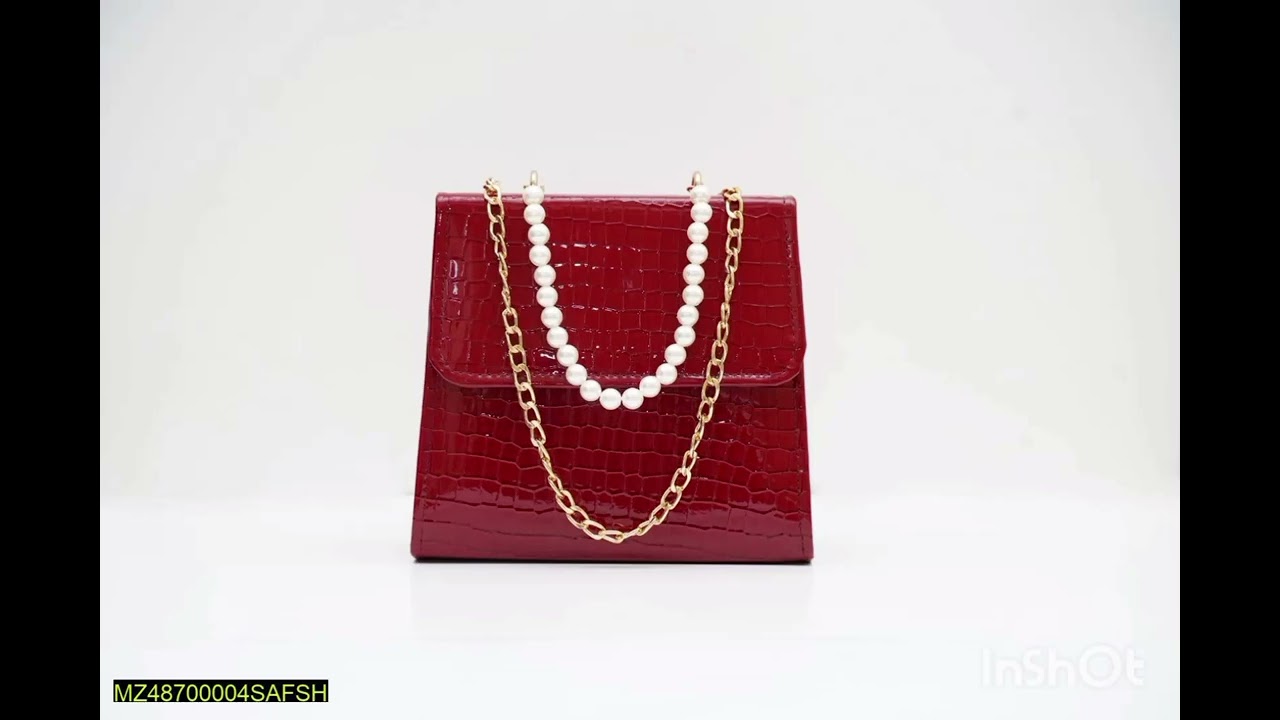 •  Fabric: Rexine•  Size: 8.5 x 8 Inches•  Pearls Top Handle•  Long Good Quality Removable Chain•