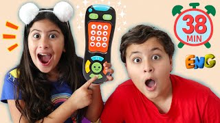 Maria Clara and JP pretend play with magical remote control