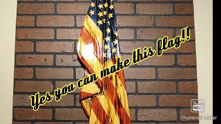 DIY Step-by-step how to make a rustic draped American flag from a 2x12 piece of lumber.