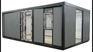 K815Gray wall panels with a flat-topped expandable house