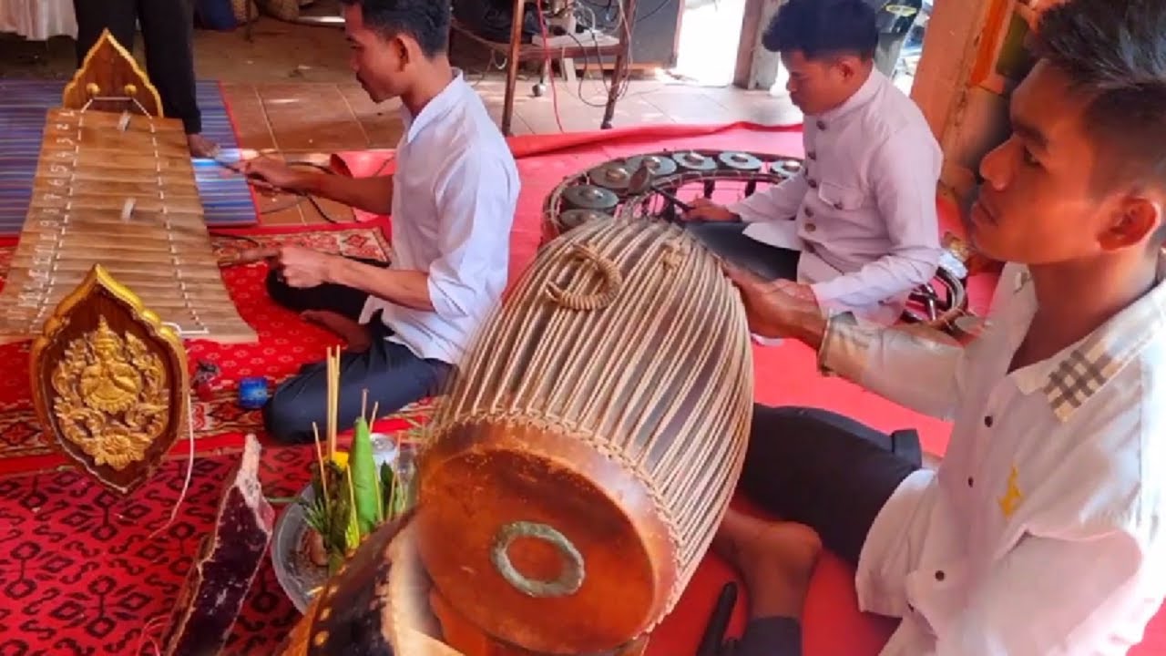 Playing traditional national music during the Pchum Ben festival season
