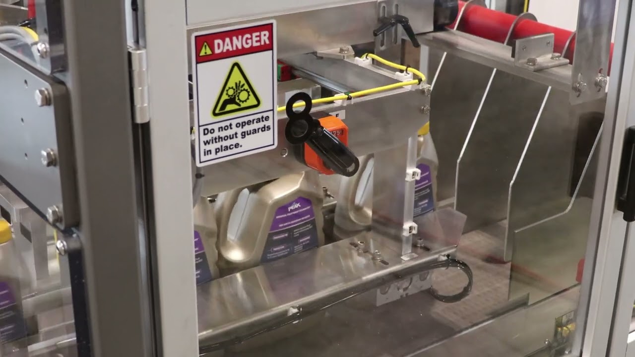 Hamrick Packaging Systems - 600D Drop Packer for an Anti-Freeze Manufacturer