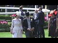The Royal family enter the parade ring at Ascot by carriage