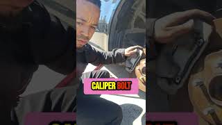 Tighten Caliper Bolts & Secure Tire Bracket Easily! #shorts