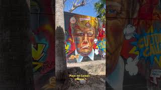 A mural in Playa del Carmen México featuring Vladimir Putin and Donald trump . We did not paint it.