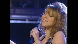 Mariah Carey and Boyz II Men open the show at the 38th annual Grammy Awards