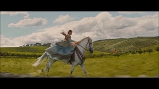 Millie Bobby Brown riding a horse in a gown - Damsel (2023) Guide