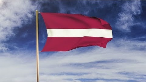 4K Latvia flag waving in the wind. Looping sun rises style. Animation loop. Green screen, alpha