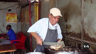 Italian expat brings pork cuisine to Burkina’s Ouagadougou | VOANews screenshot 3