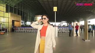 Elli Avram looks stunning in orange-white travel look, check out the stunning pics here