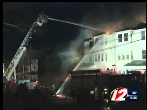 Crews battle triple house fire in Fall River - YouTube