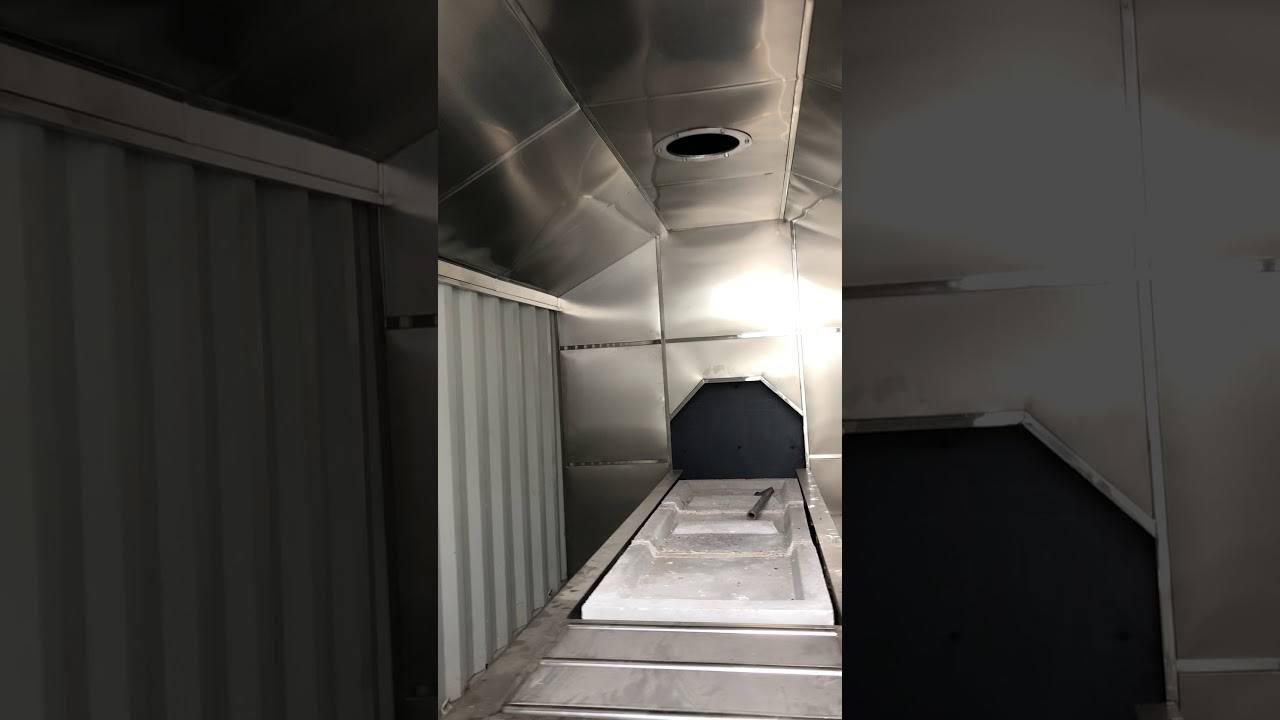 What is containerized  cremation machine?