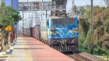 Pavoorchatram/BOBYN rake loaded freight train smoothly accelerating by GDDE/WAG-7/27764 Locomotive