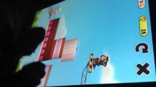 Cat plays my talking Tom cake tower