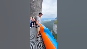 Cliffside Slide?! 😱🔥 #HighAltitudeExtreme #VisualSpectacle