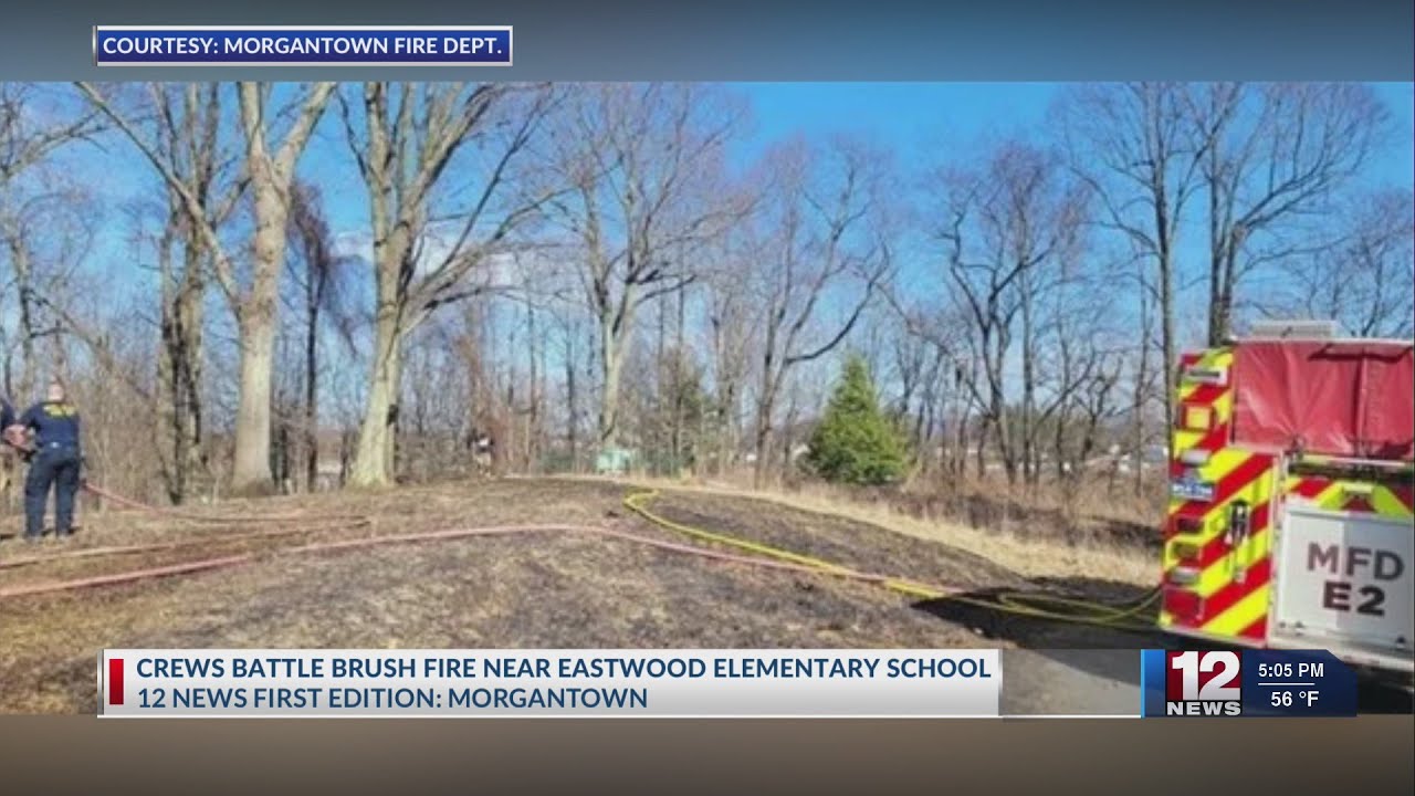 Crews battle brush fire near Eastwood Elementary School - YouTube
