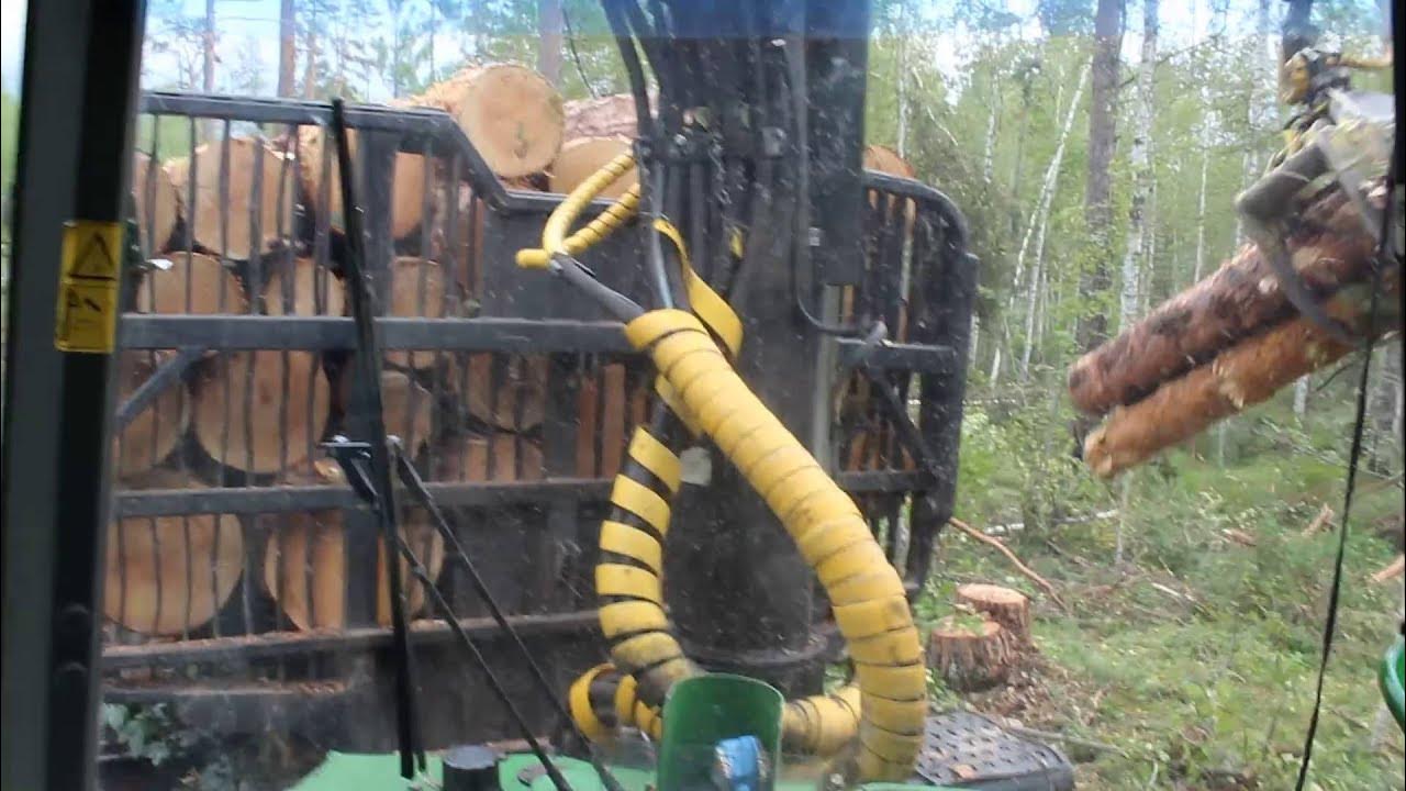 Работа в лесу видео. Харвестер john deere 1710d. Работа в лесу видео. Лесных смирнова. Работа чокеровщик в лесу.