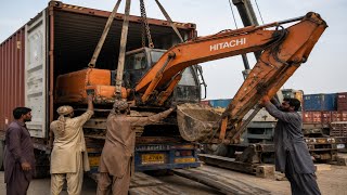 Pakistani Mechanics Rejoining Excavator Parts After Import To Pakistan