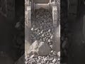 🪨 Gravity meets grit watch tons of rock cascade like a stone waterfall! #RockDump #ConstructionVibes