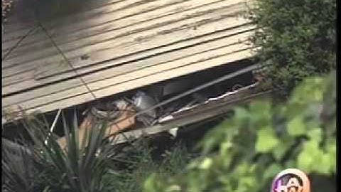 HOUSE SLIDES DOWN HILL AFTER RAIN