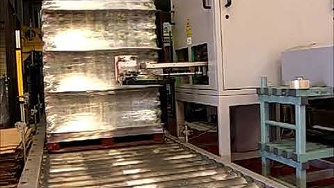 Print and apply label applicator - Automatically applying a label to a pallet at High Speed