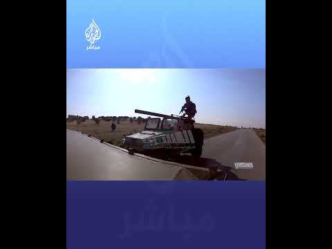 من المسافة صفر مقاتل من المعارضة السورية يشتبك مع عناصر وآليات للنظام السوري