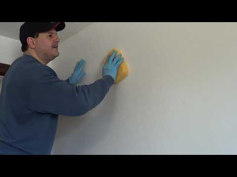 How to remove old wallpaper glue with out chemicals once the wallpaper has been removed