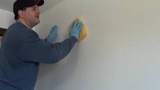 How to remove old wallpaper glue with out chemicals once the wallpaper has been removed