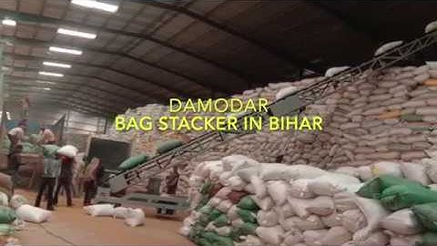 Paddy Bag Unloading and Stacking Conveyor. Mail - info@damodarprocess.com  Phone- +91 96747 45952