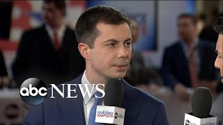 Pete Buttigieg sits in after the New Hampshire debate  | ABC News
