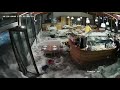 Wave Crashes Through Windows of Italian Restaurant