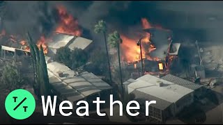 A southern california mobile home community is burning as strong santa
ana winds sweep the region. fire erupted in calimesa area of riverside
county ...