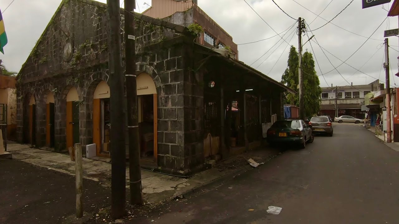 walking village rose belle old small market in mauritius POV
