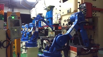 Yaskawa robots press handling