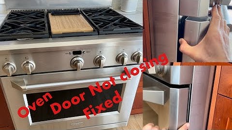 Monogram oven door does not stay closed from one side . Fixed