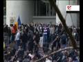 This footage from Romanian tv station Realitatea TV shows demonstrators and police clashing violently on Tuesday in the Moldova capital Chisinau, just outside the parliament.