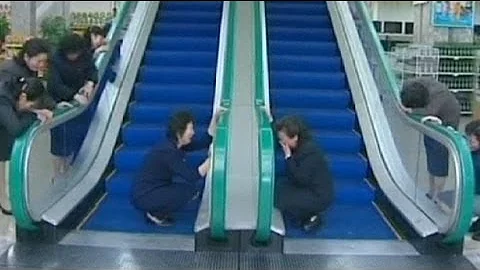 Mourners weep at escalator used by Kim Jong-il - DayDayNews