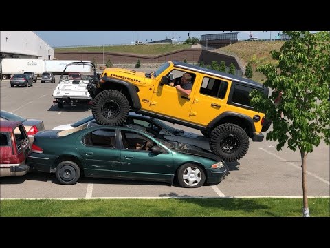 Jeep JL Wrangler Crushing some cars. 37” Trepadors. 2” Mopar Lift JLU Rubicon Method wheels 106