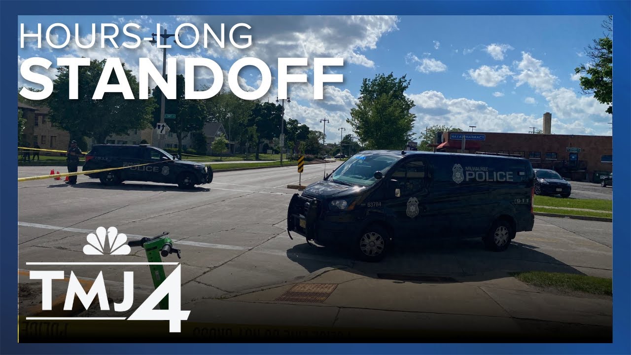 Man taken into custody after an hourslong standoff outside pharmacy