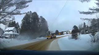 CAT Grader With Multiple Snow Blades