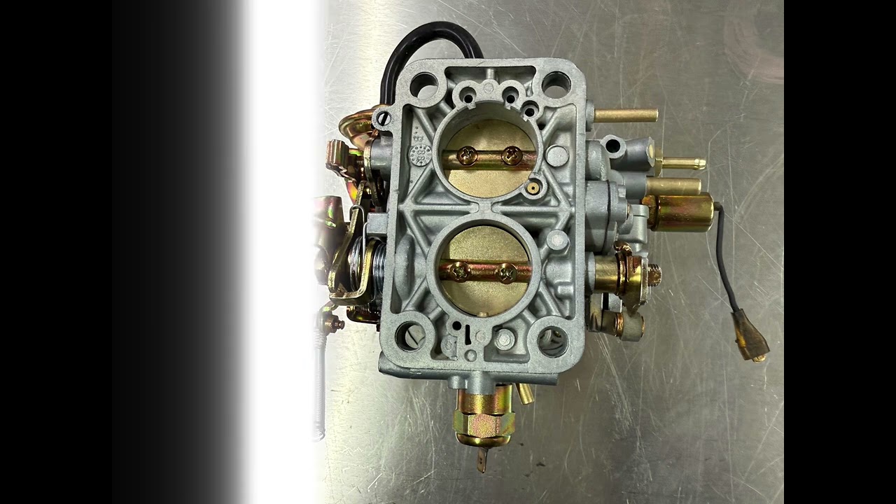 Weber 32/34 DMTL carburettor looking mighty after a full restoration.