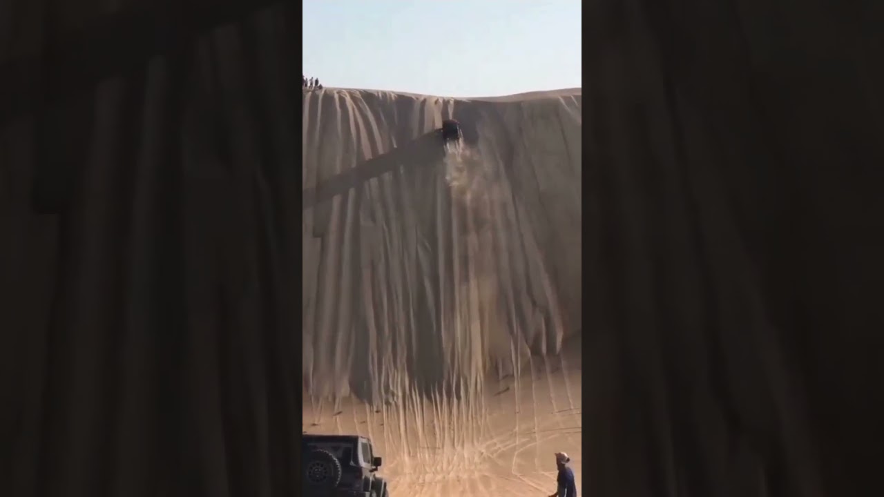 Car running in 80 degree slope Desert 