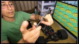 Traxxas E – Revo 2.0 VXL Hot Racing spring review & Rod end replacement