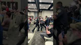 Police Forcibly Remove Protester From Representative Taylor Greene Event In Georgia
