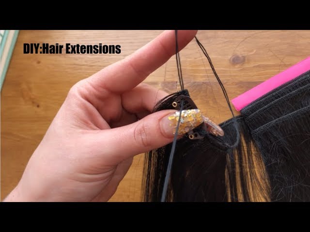 DIY Holder for your Hair Extensions: clip your extensions on the the rubber  band for a PERFECT ext…